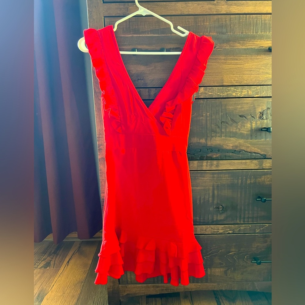 Red ruffled dress made by Suzanne Betro